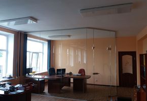 UALCOM Company realized the office of the head of a large trading company with glass interior.